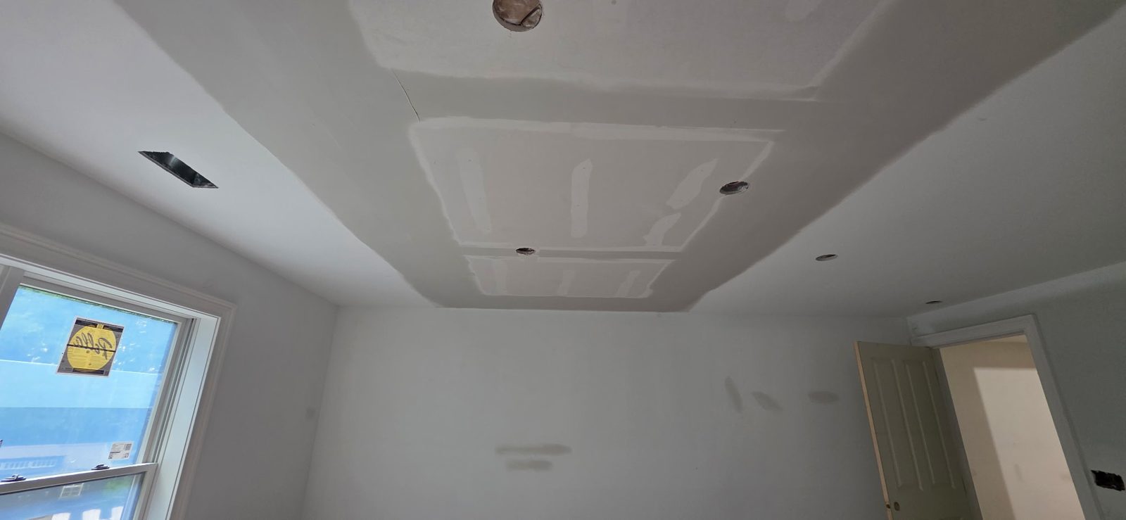 Another angle of residential ceiling patch and finish work